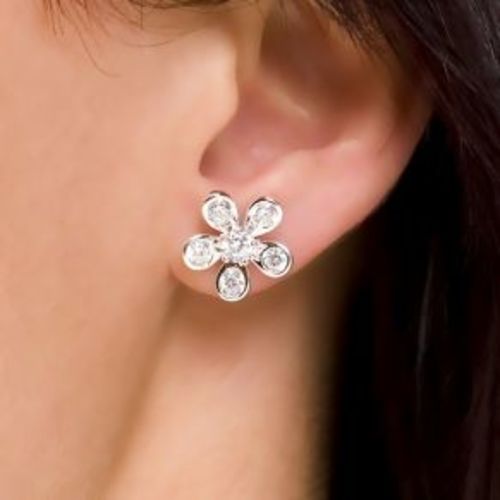 silver earrings design of flower with stones